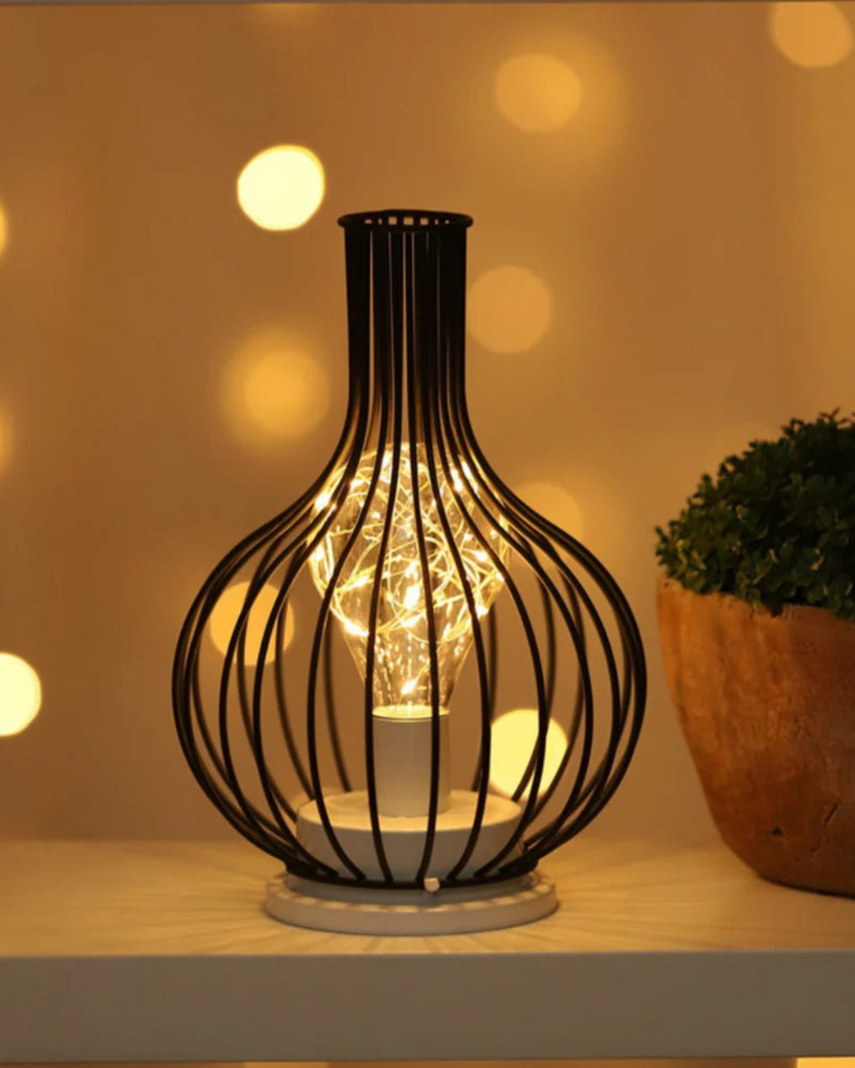 Noirvane – Lámpara de mesa con jaula negra minimalista