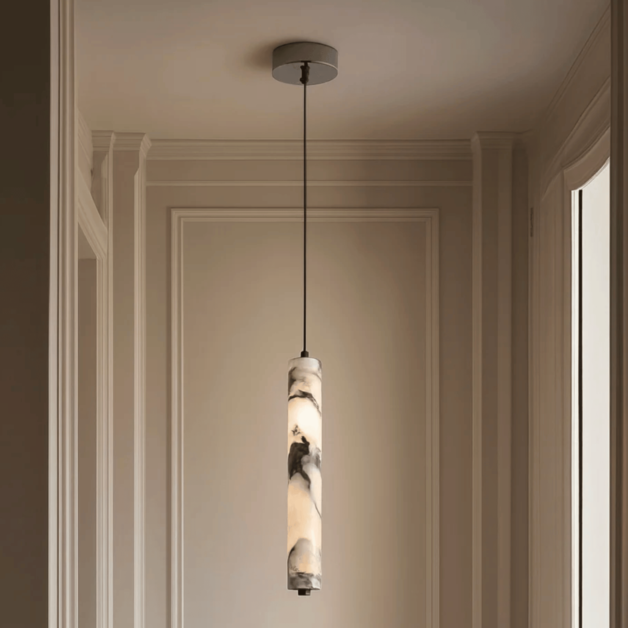 Baskorin – Suspension cylindrique en pierre noire