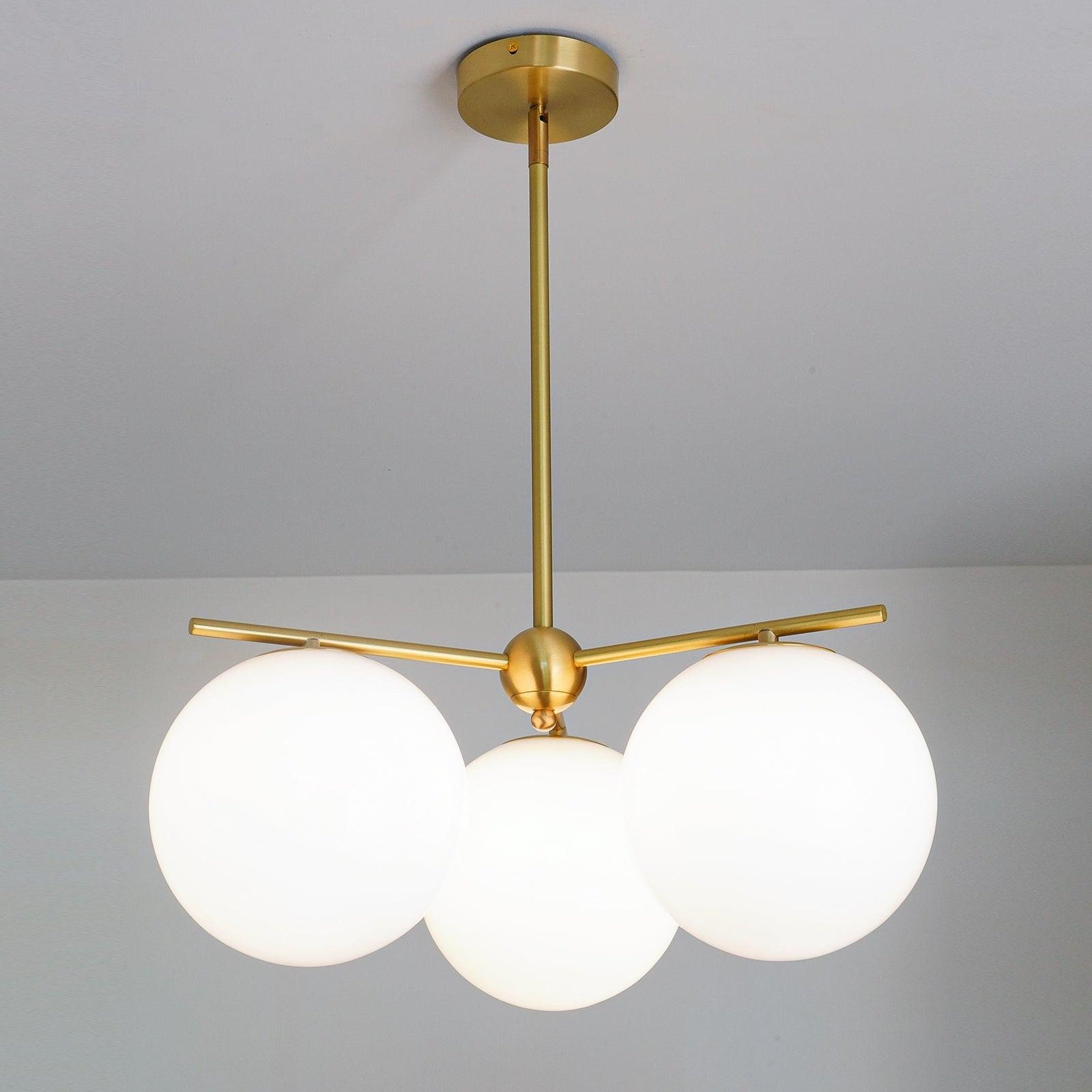 Brassari - Lampadario a stelo con sfera in ottone di lusso